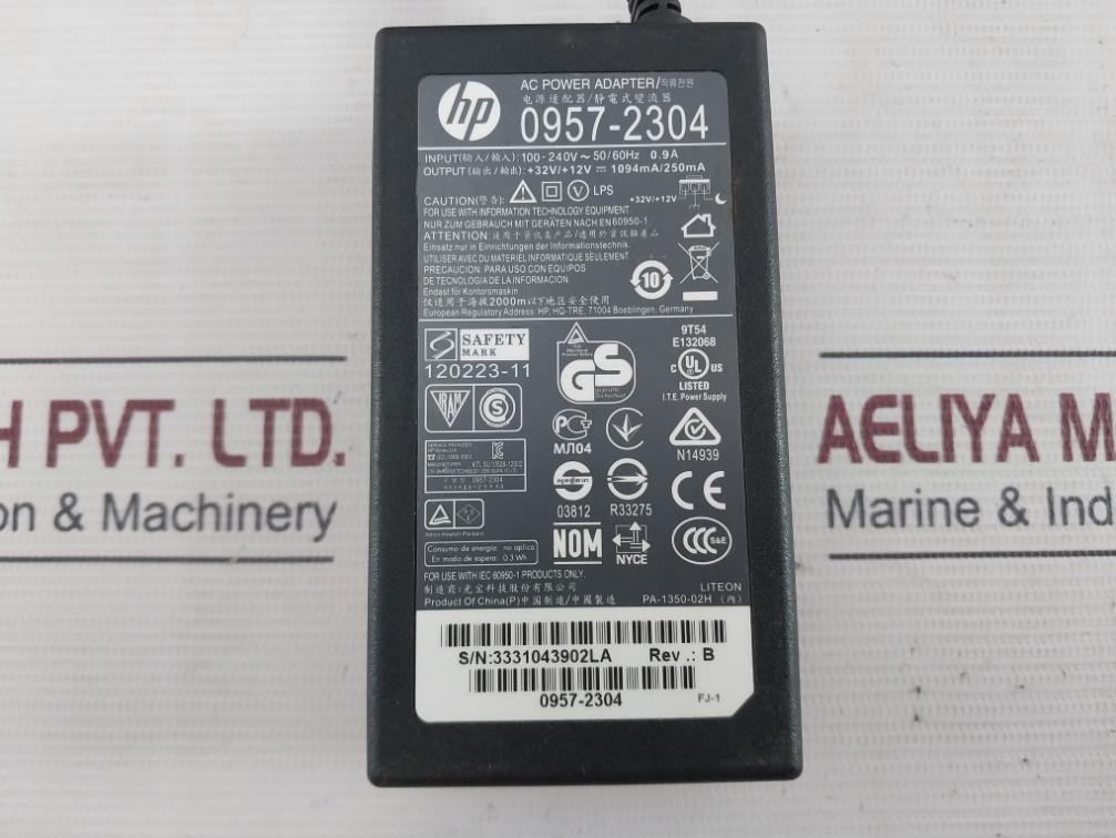 Hp 0957-2304 Ac Power Adapter Rev.: B 100-240V 50/60Hz 0.9A 1094Ma/250Ma