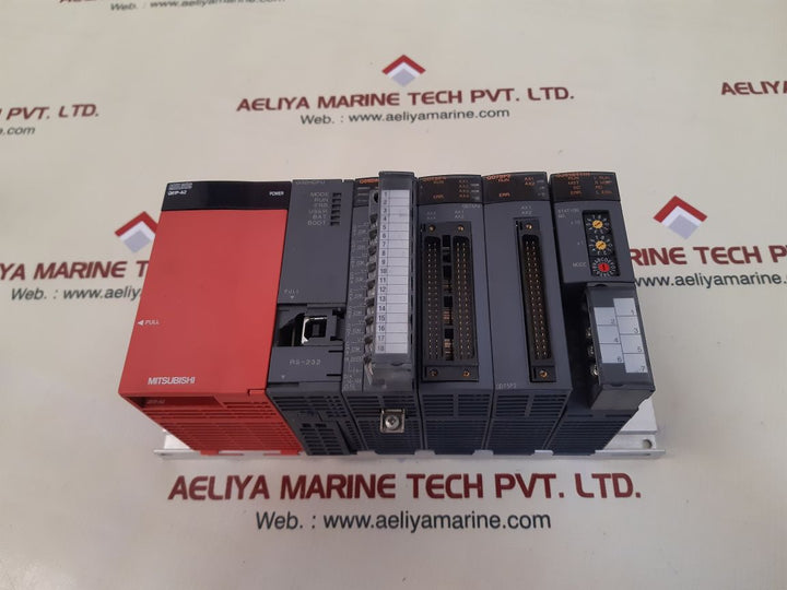 Mitsubishi melsec q61p-a2,q02hcpu,q68davn,qd75p4,qd75p2,qj61bt11n module rack