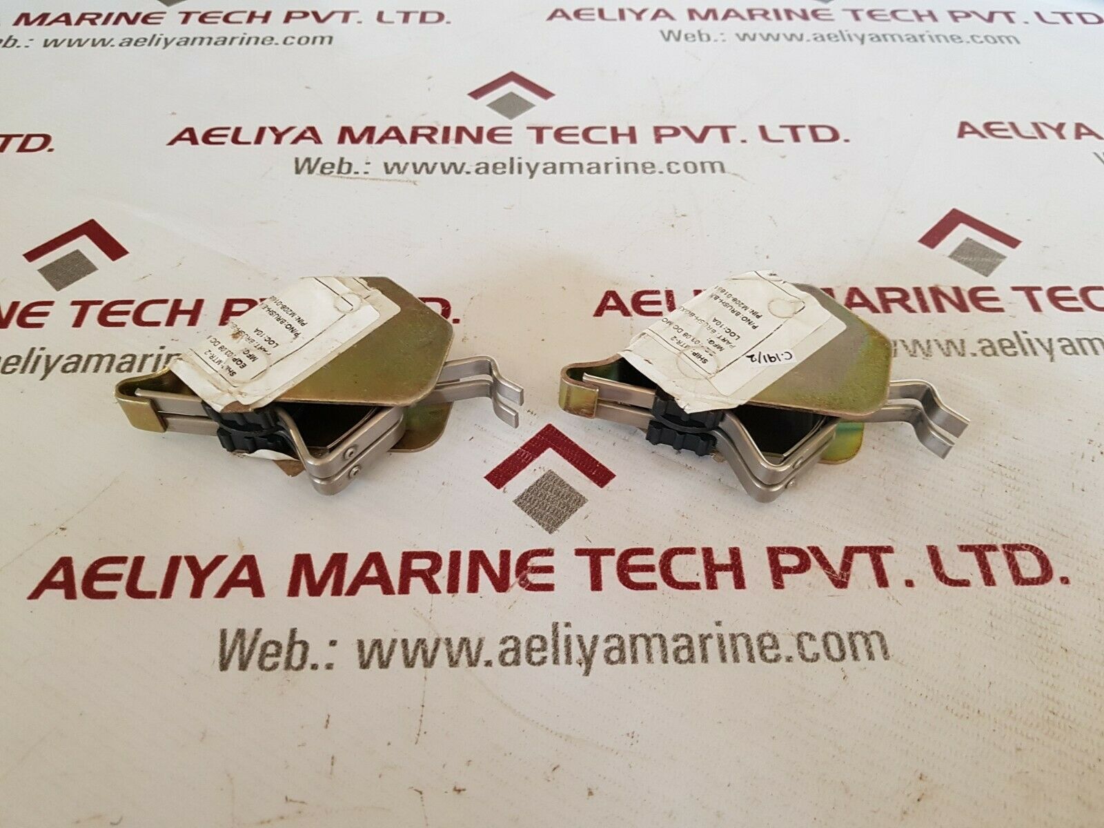 Brush-boxes for part of the holder assembly (spring)