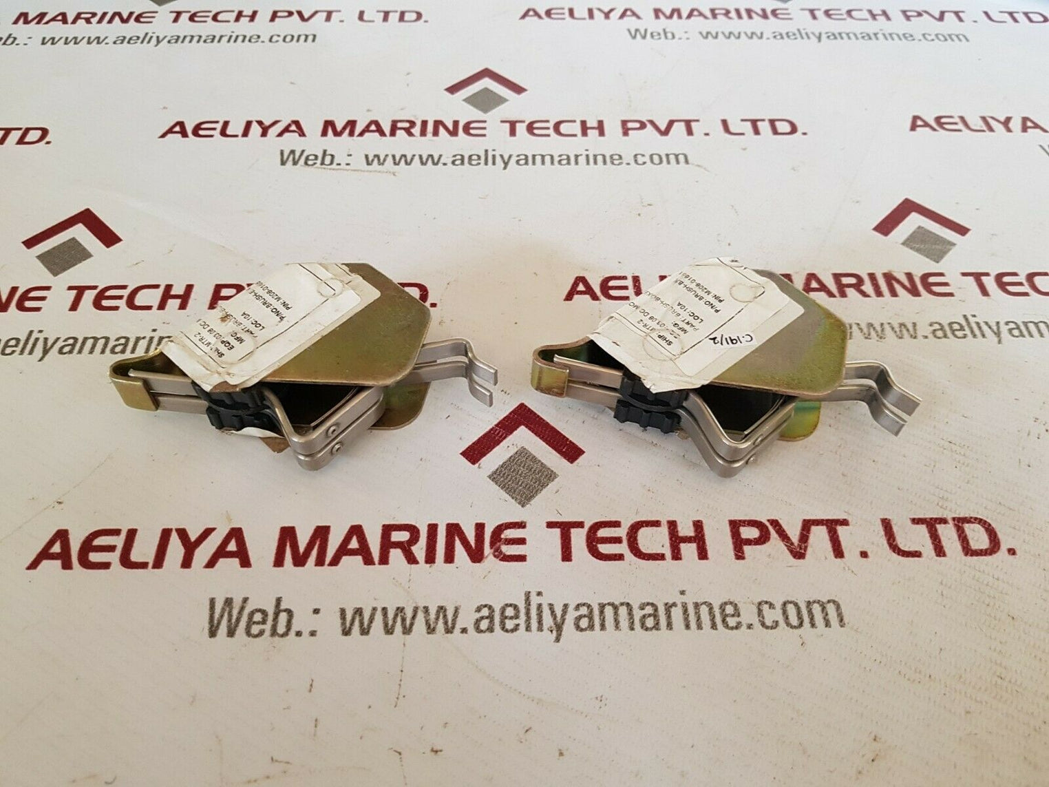 Brush-boxes for part of the holder assembly (spring)